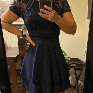 Navy blue dress a line and tiered.